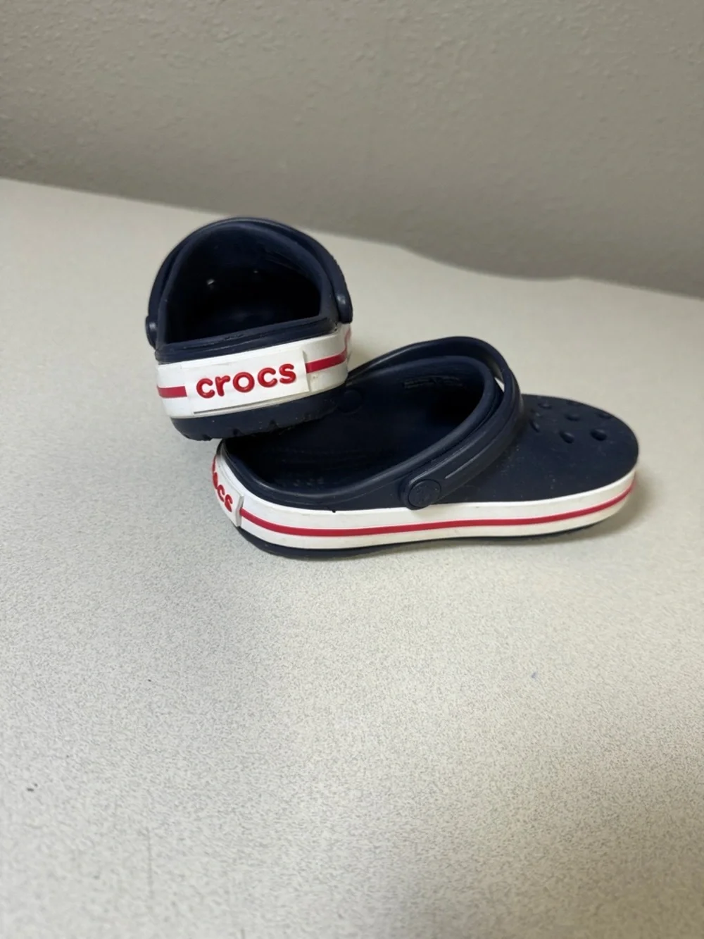 CROCS Kids Navy Clogs with White and Red Trim